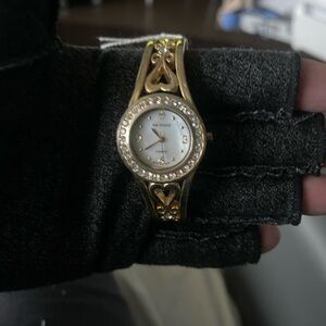 Kim Rogers Gold Tone Cuff Watch with Crystal Accents. Japan movement.